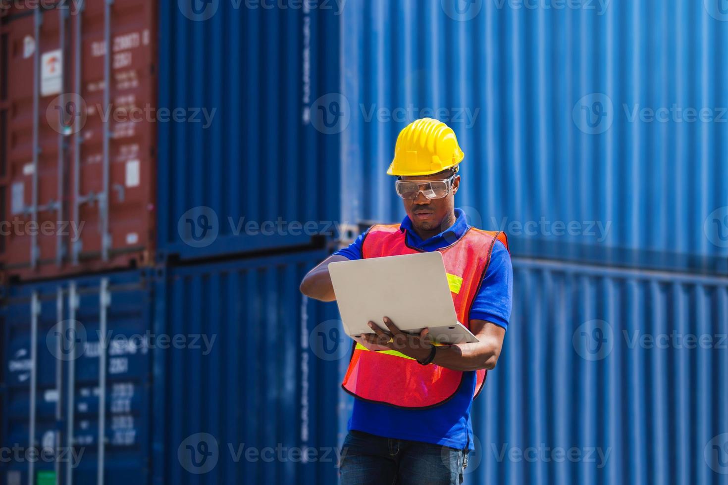 Worker man in hardhat with clipping path and safety vest holding