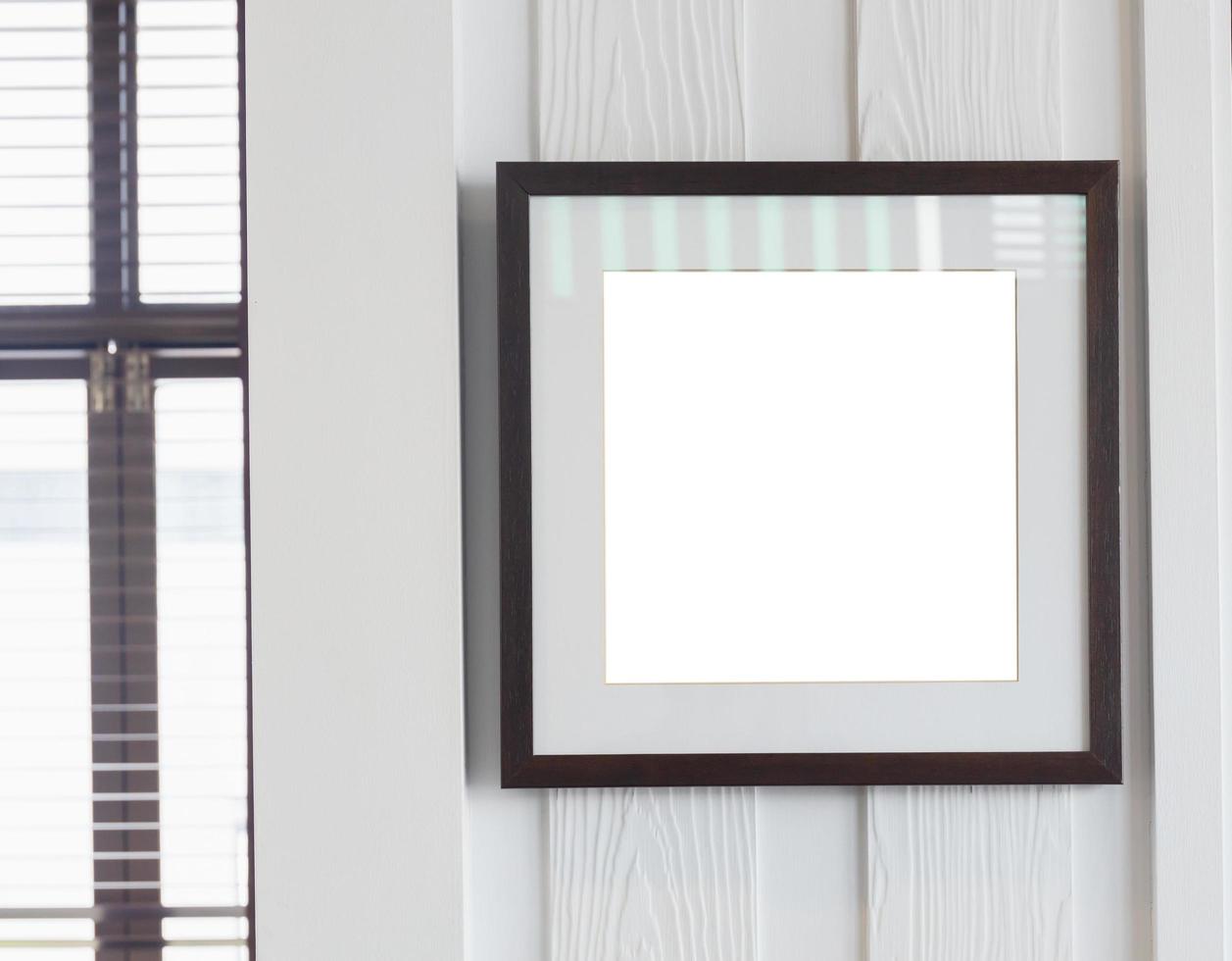 Blank photo frames on the wall for your design