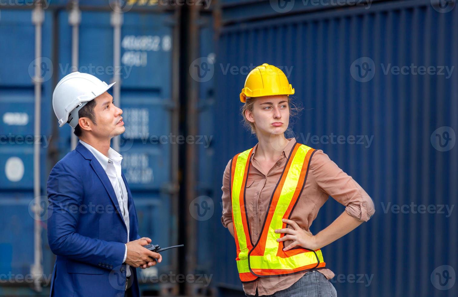 Engineer and worker team checking containers box from cargo, Logistic and teamwork concept photo
