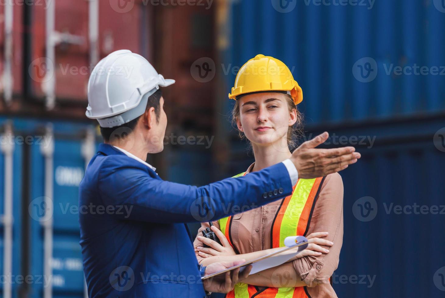 Engineer and worker team checking containers box from cargo, Logistic and teamwork concept photo