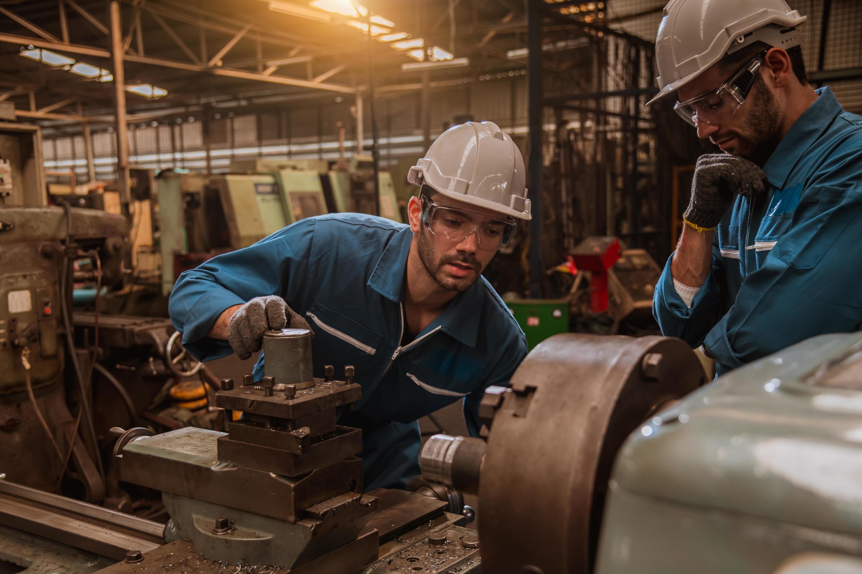 Industry engineering wearing safety uniform control operating computer ...