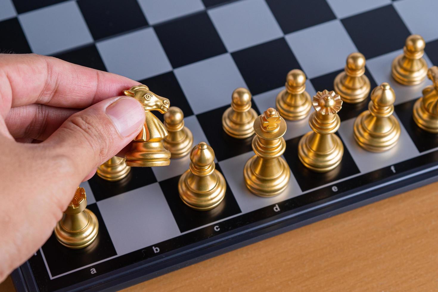 Top view of chess game on chessboard photo