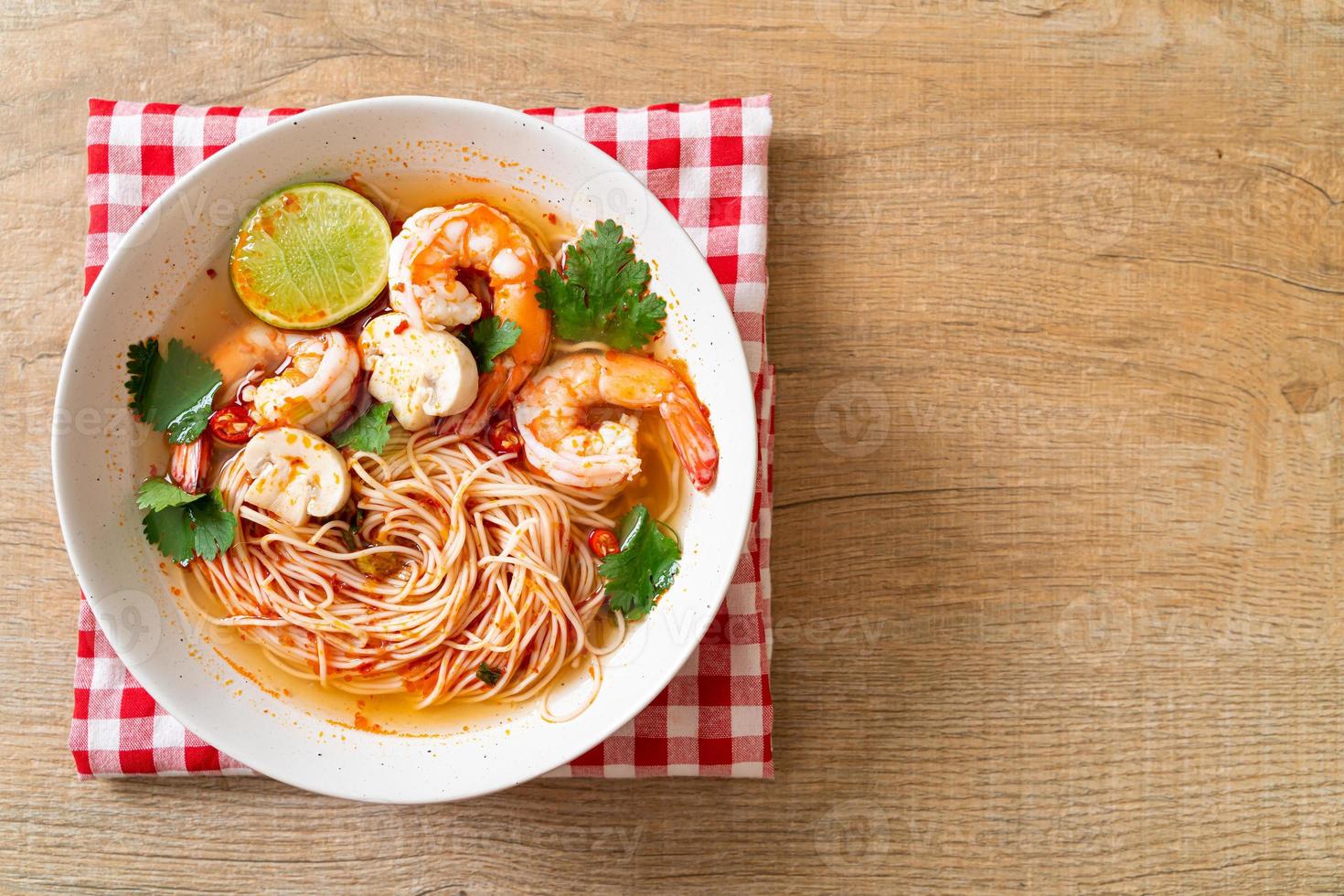 noodles with spicy soup and shrimps photo