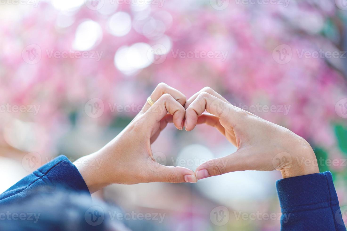 A hand that shows love to lovers on the day of love Love day With copy space photo