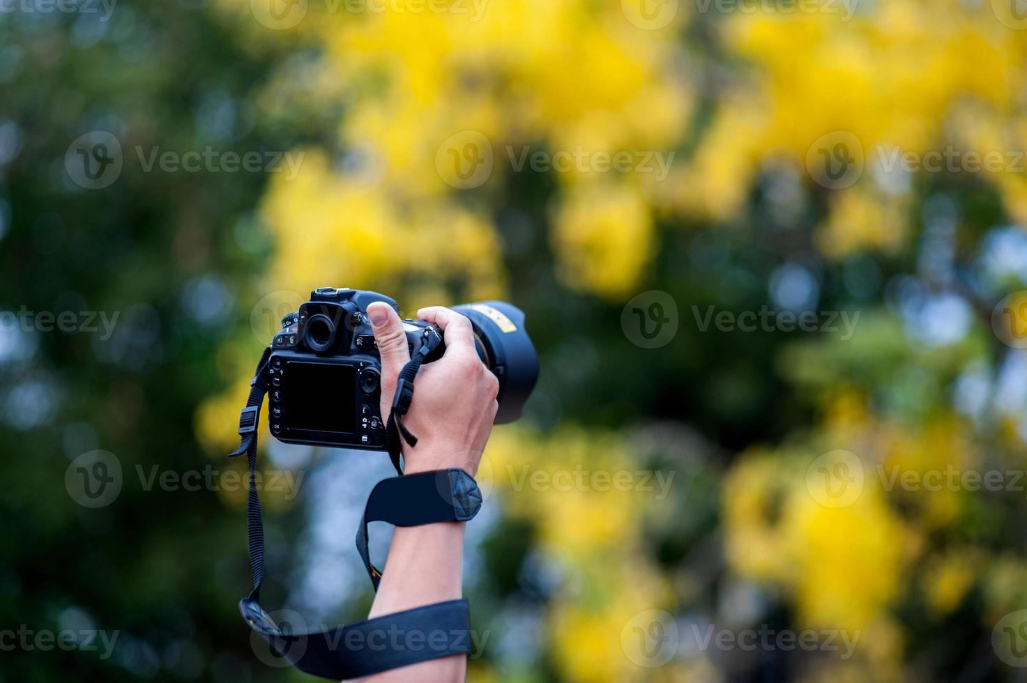 fotografía de mano y equipo fotográfico del fotógrafo concepto fotógrafo foto