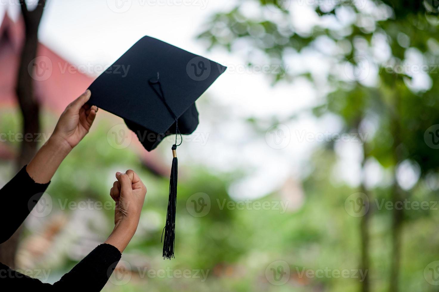 Graduates are expressing joy at graduation. He is a successful person - image photo