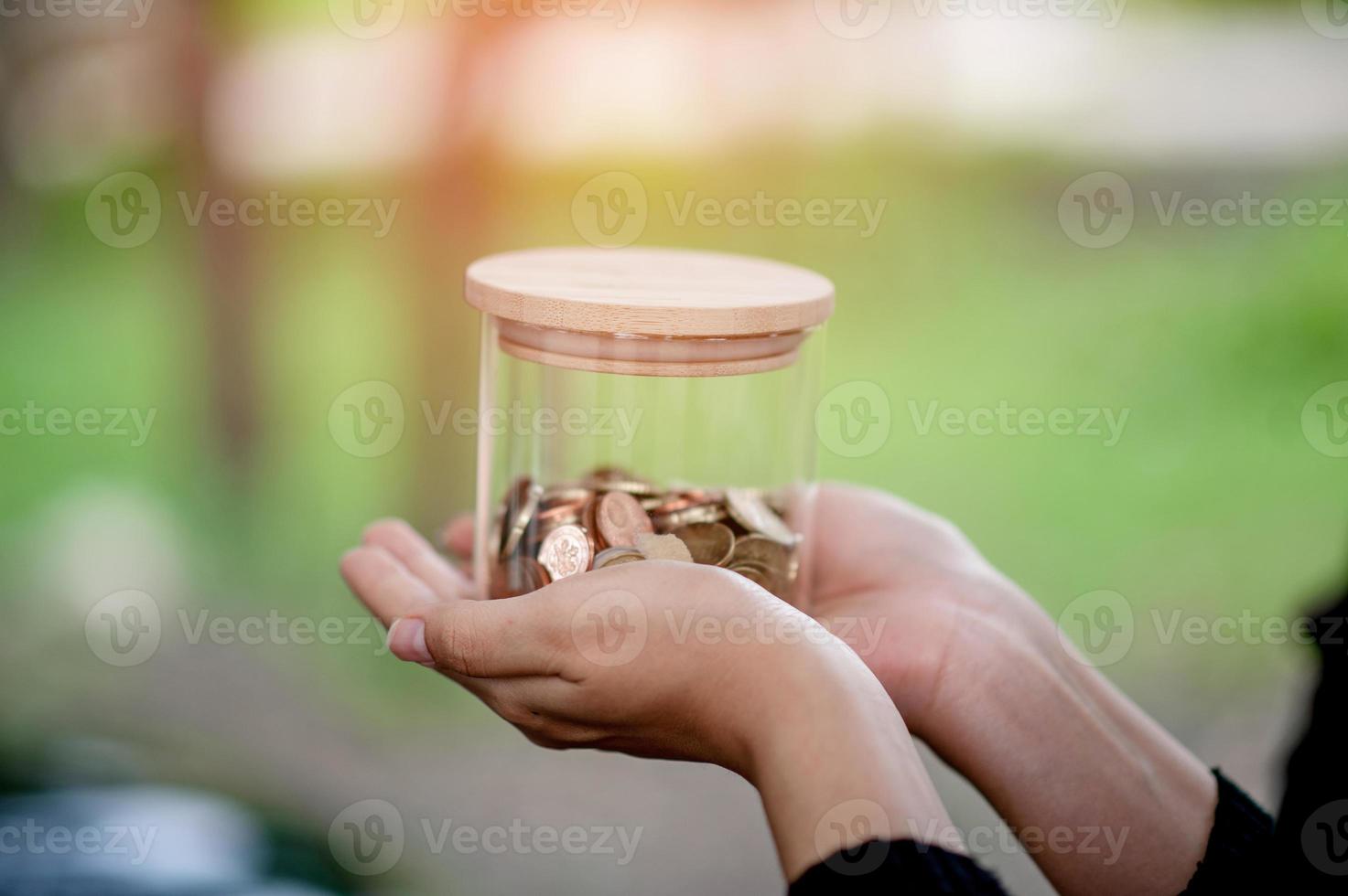 Hands and savings of close-up young women for business Business concept - image photo