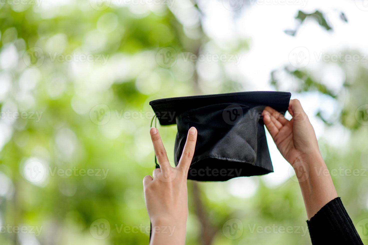 Graduates are expressing joy at graduation. He is a successful person - image photo