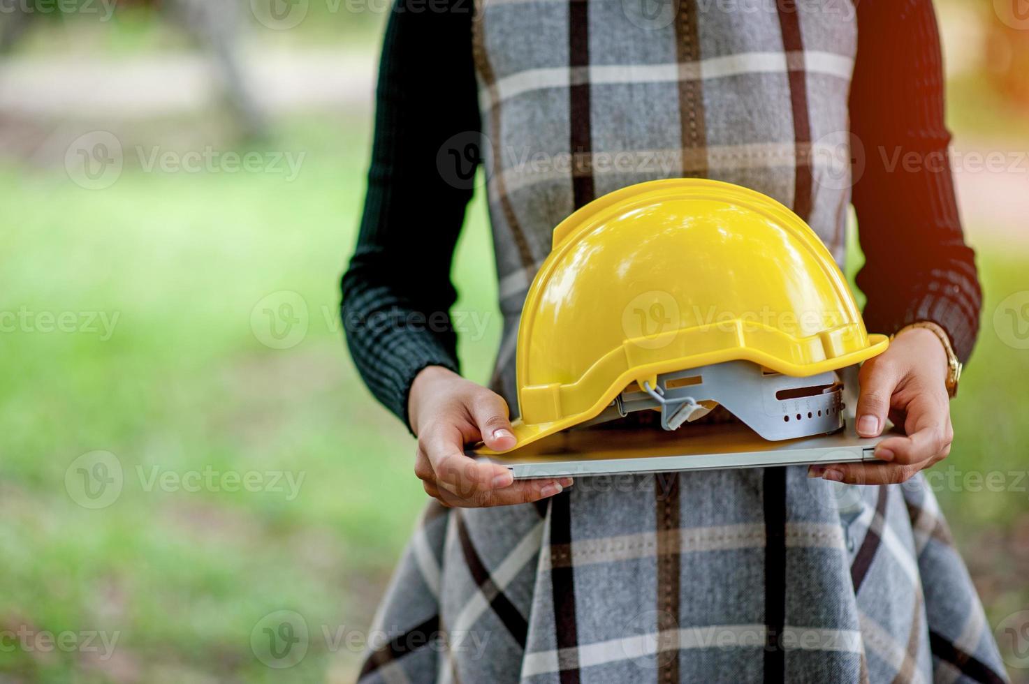 The hands and caps of the female engineering engineer Leader ability Industrial concept photo