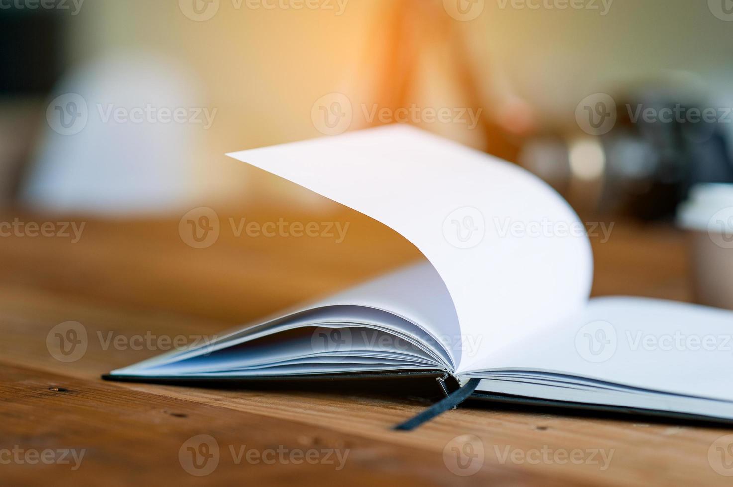 The book is placed on a business desk. The concept of reading with copy space. photo