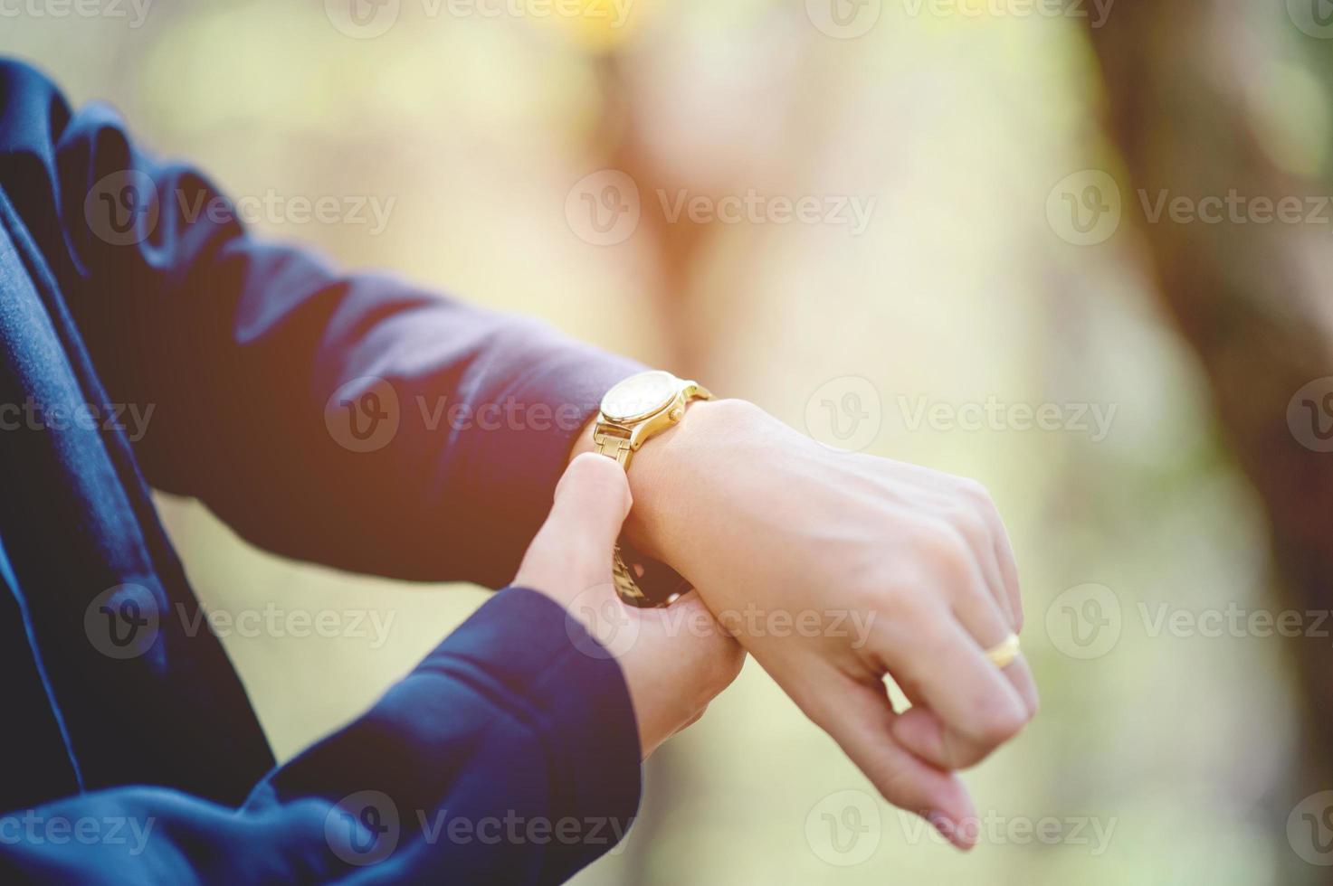 Hands and wrist watches worn Time view concept With copy space photo