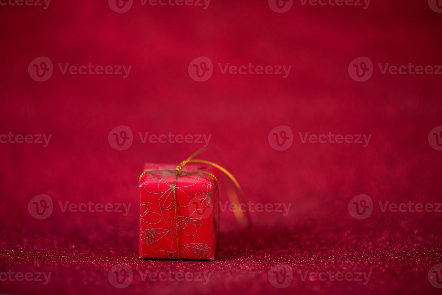 Red background image and gift box Valentine's Day concept photo