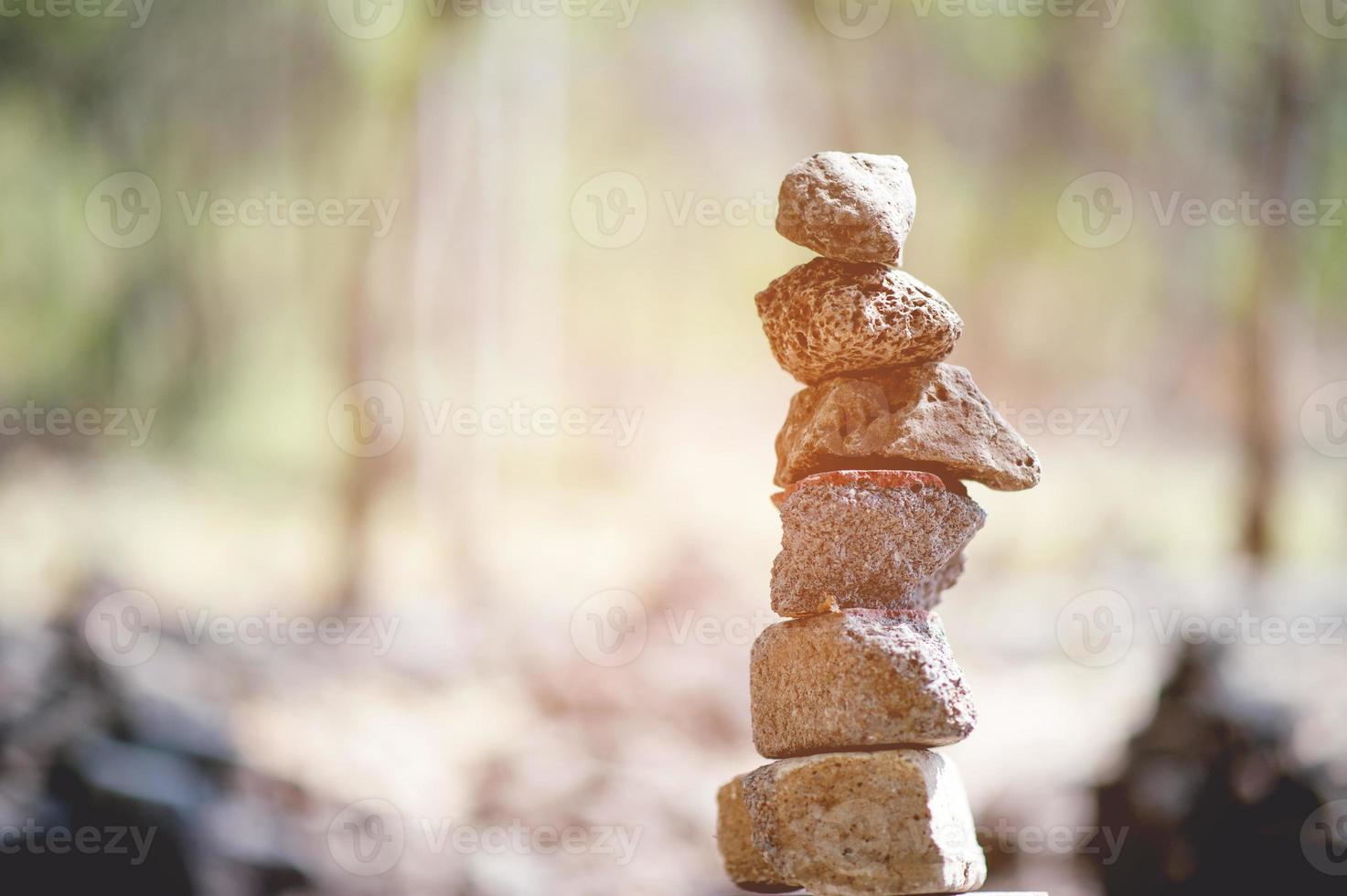 The stones that are laid against each other are like unity and teamwork.Team concept With copy space photo