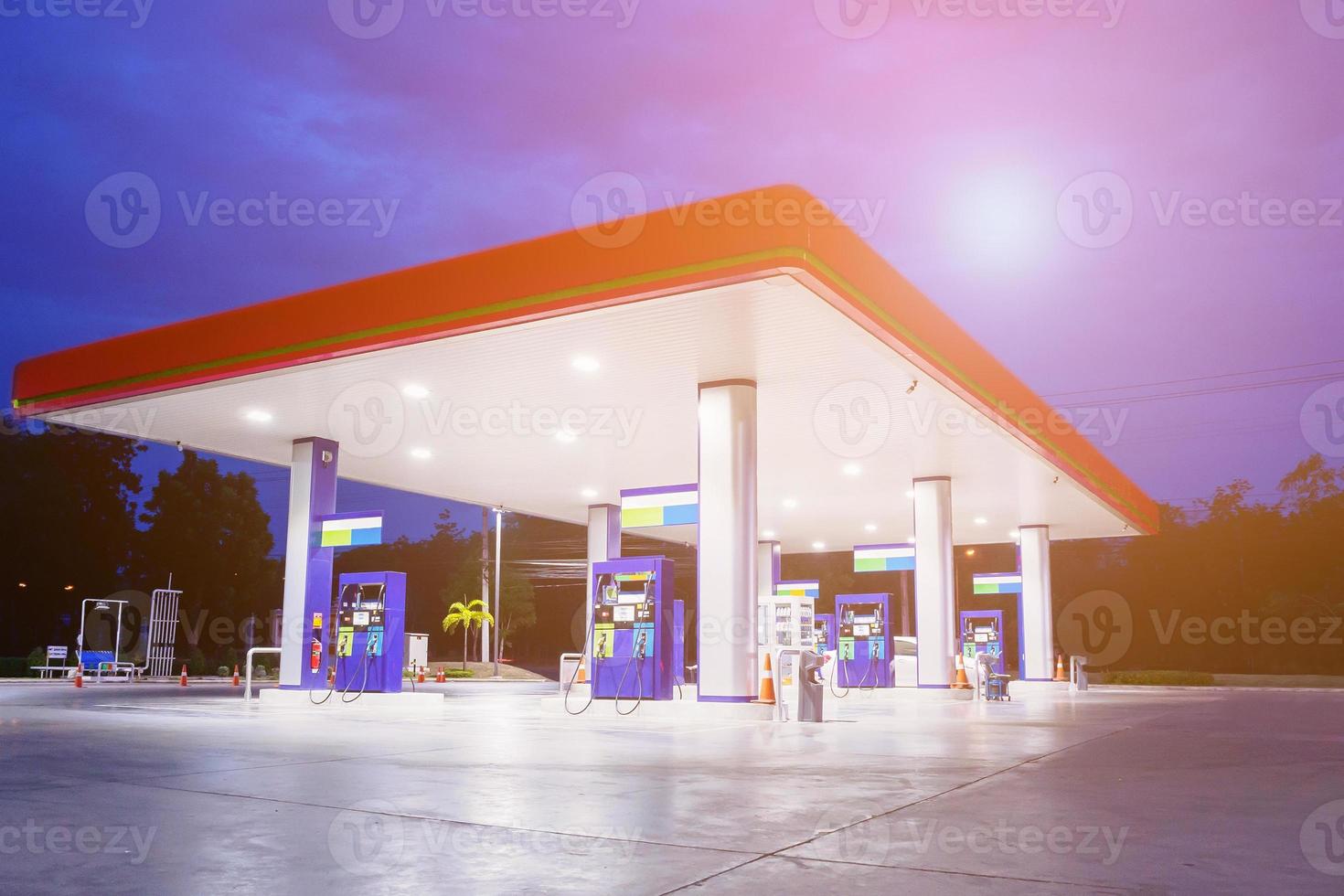 Gas station at night time photo