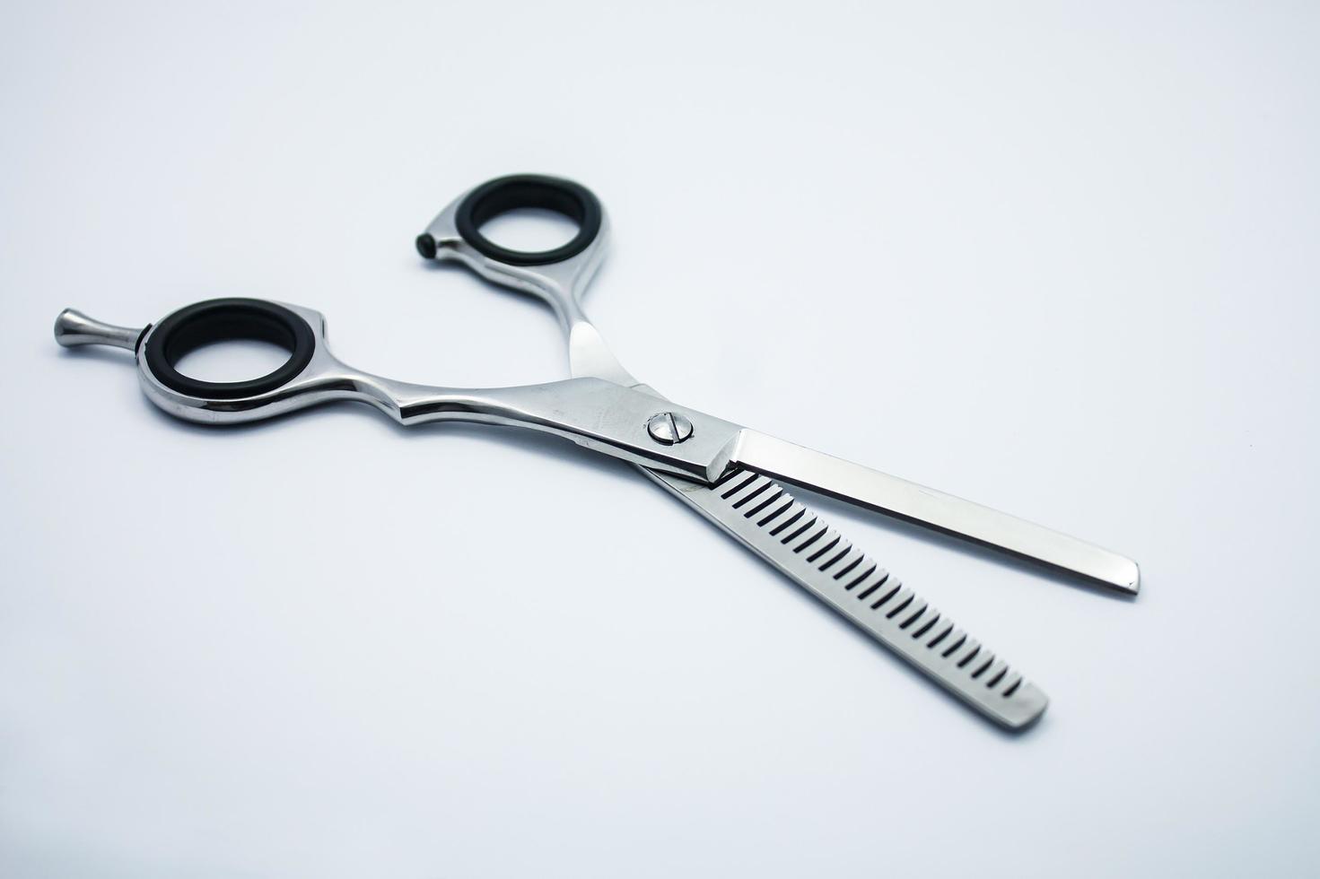 professional scissors for haircuts on white background photo