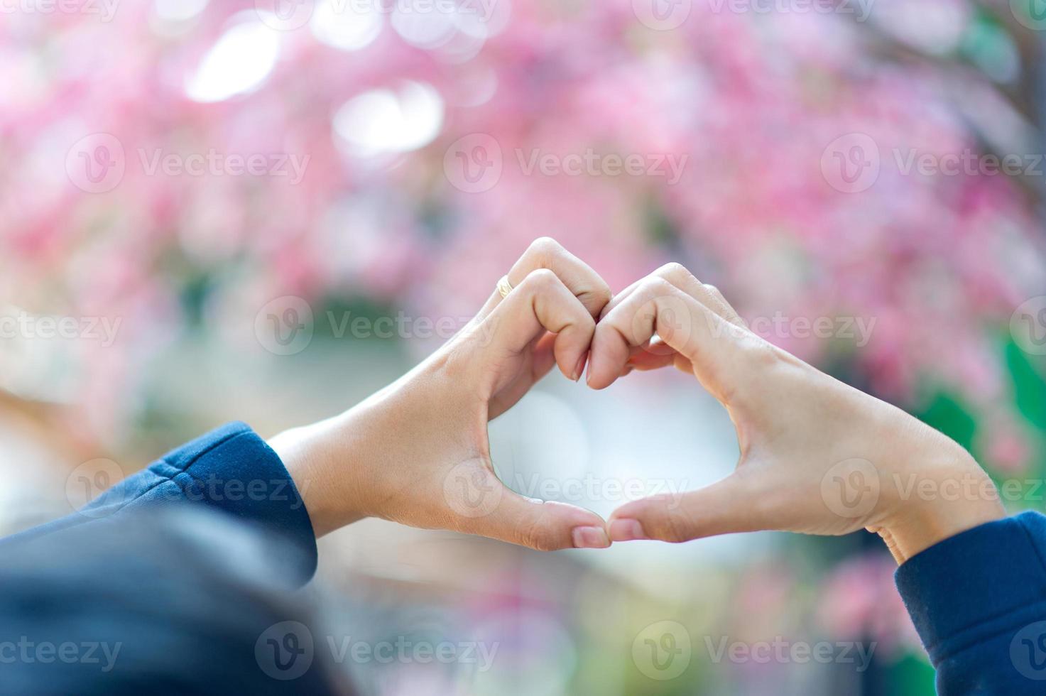 A hand that shows love to lovers on the day of love Love day With copy space photo