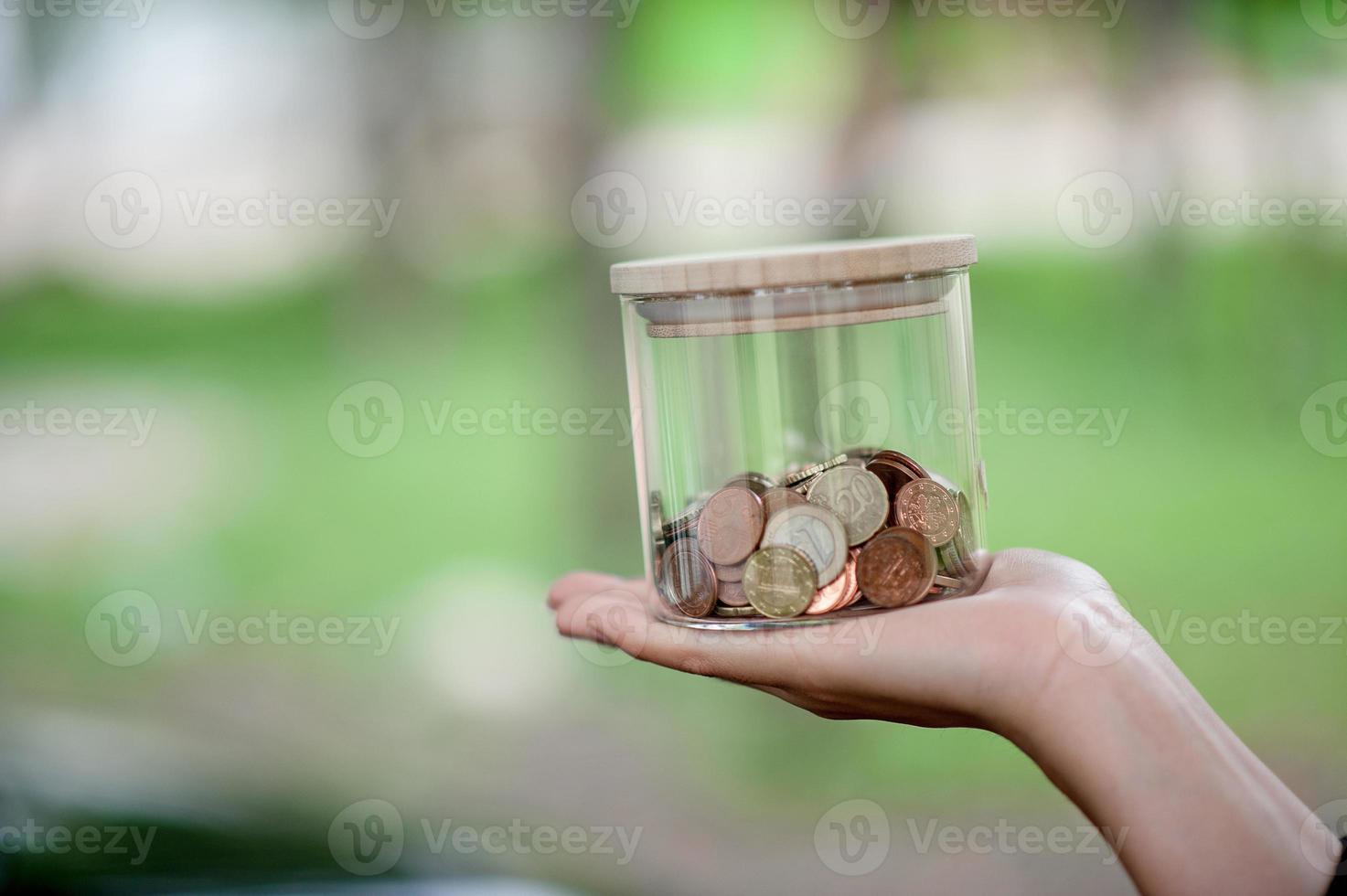 Hands and savings of close-up young women for business Business concept - image photo
