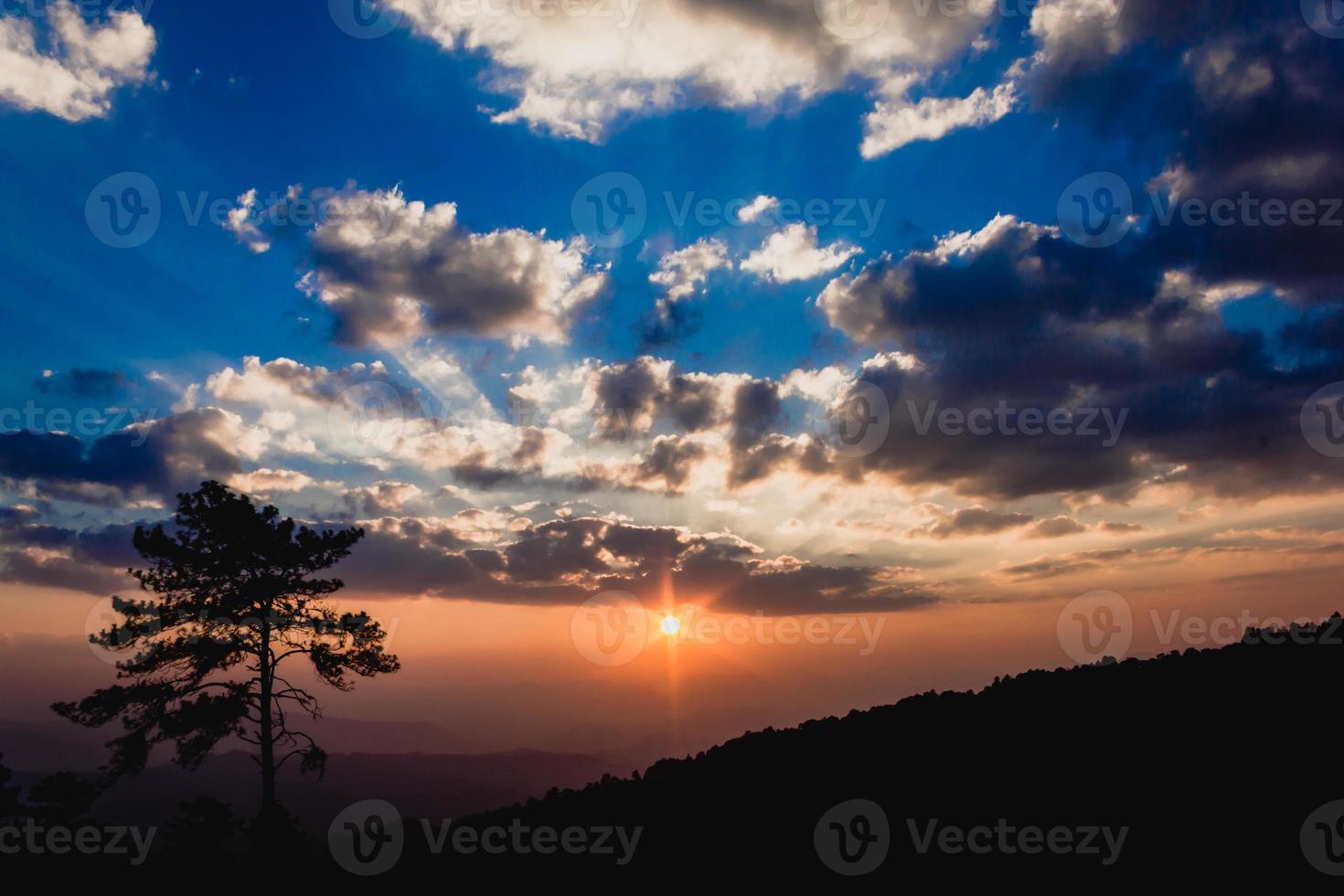 Beautiful sky and sunset over the mountains photo