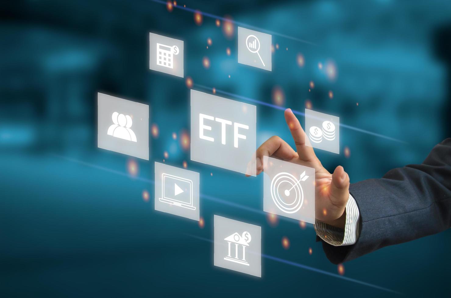 hand touching screen digital virtual futuristic interface icon ETF Exchange Traded Fund. Business stock market finance Index Concept. photo