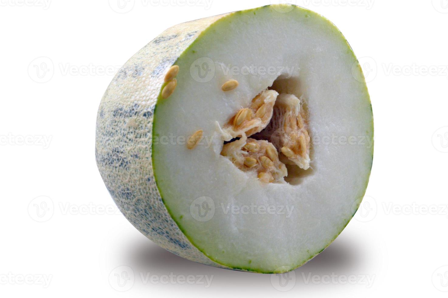 half cut melon with grains photo