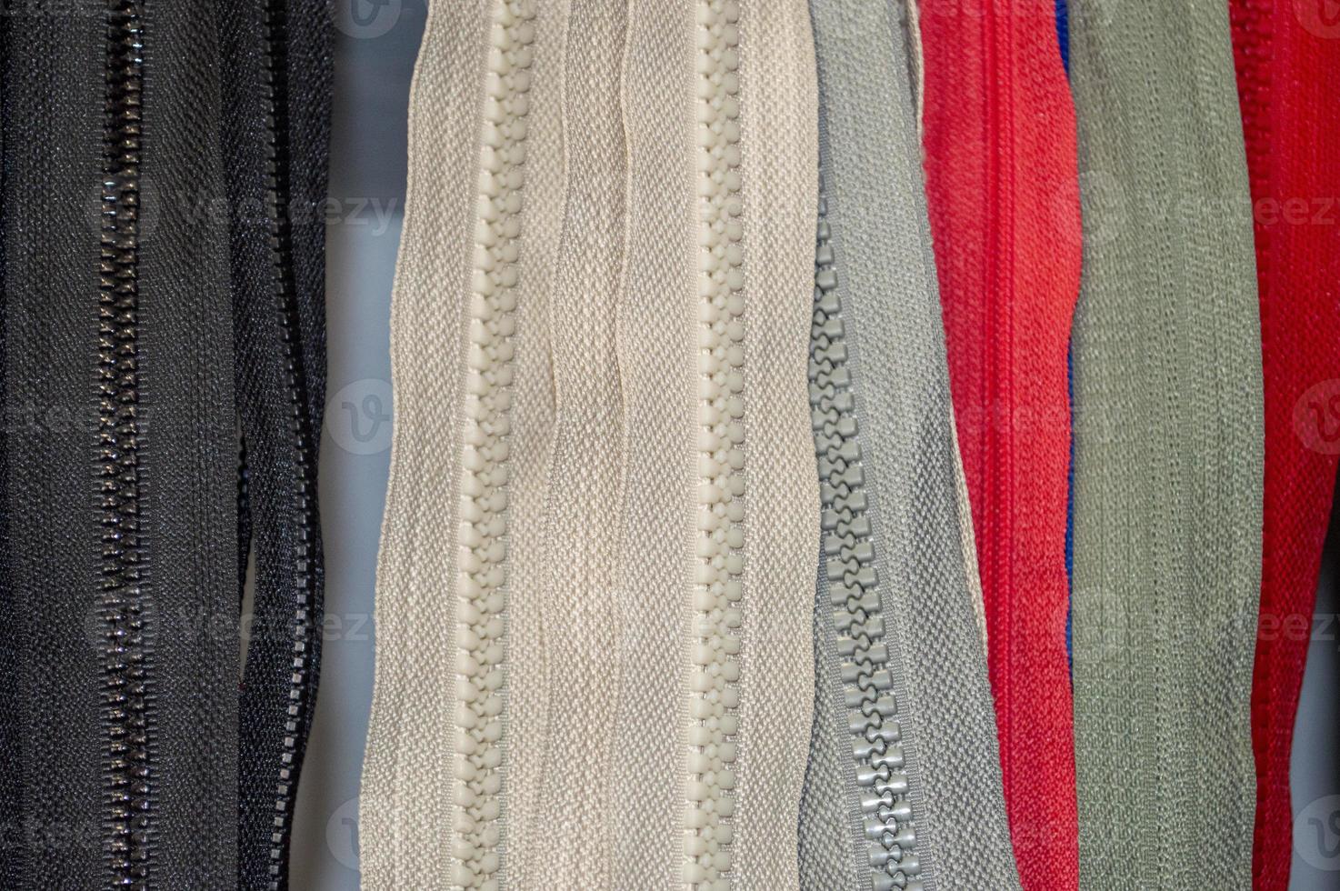 multicolored zippers for clothes photo