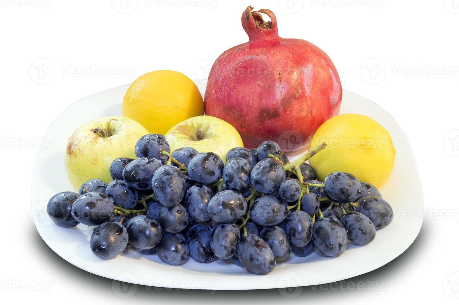 pomegranate, grape with apple and lemon photo