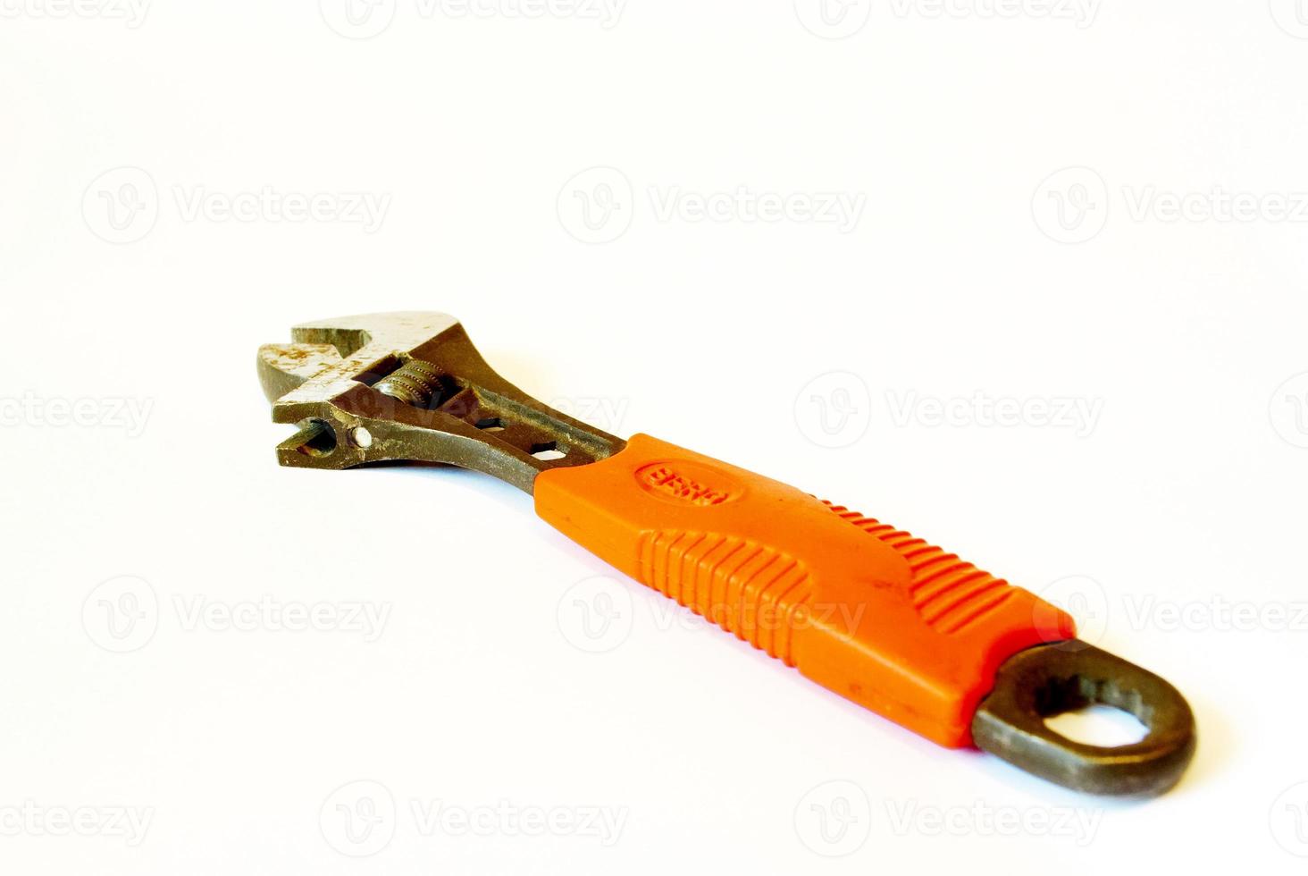 wrench with an orange handle photo
