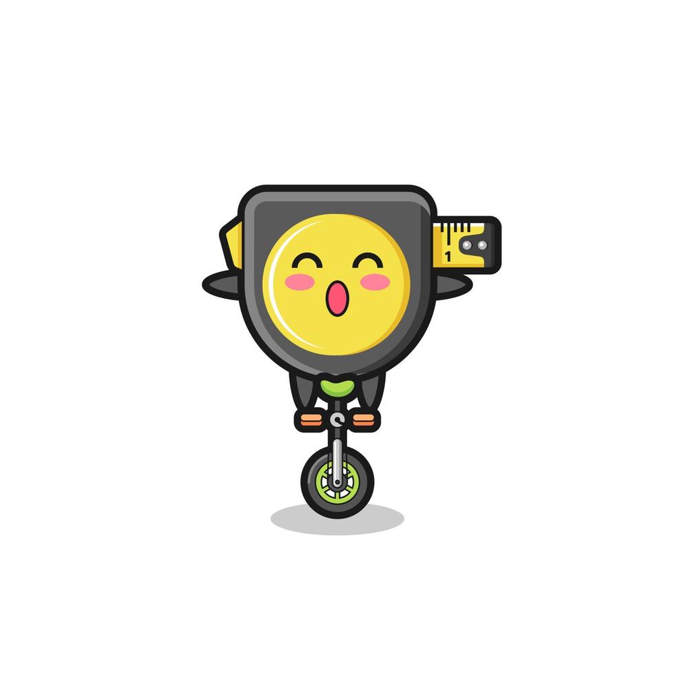 The cute tape measure character is riding a circus bike vector