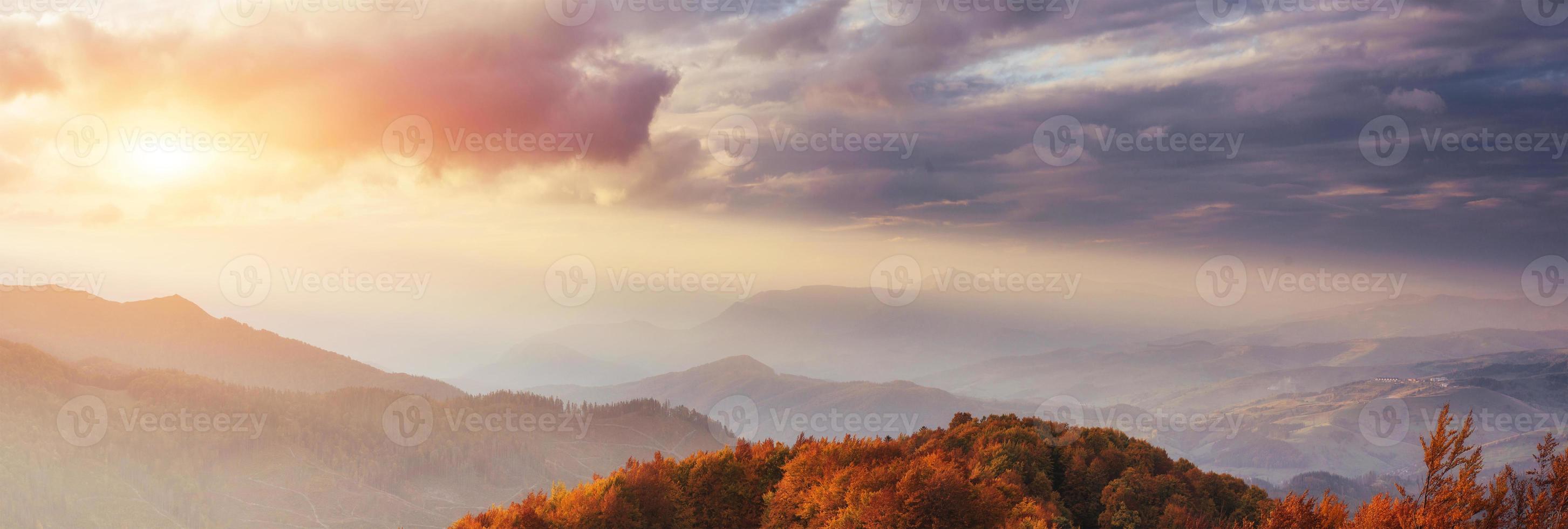 Waterfall in autumn sunlight. Beauty world. Carpathians. Ukraine. Europe photo