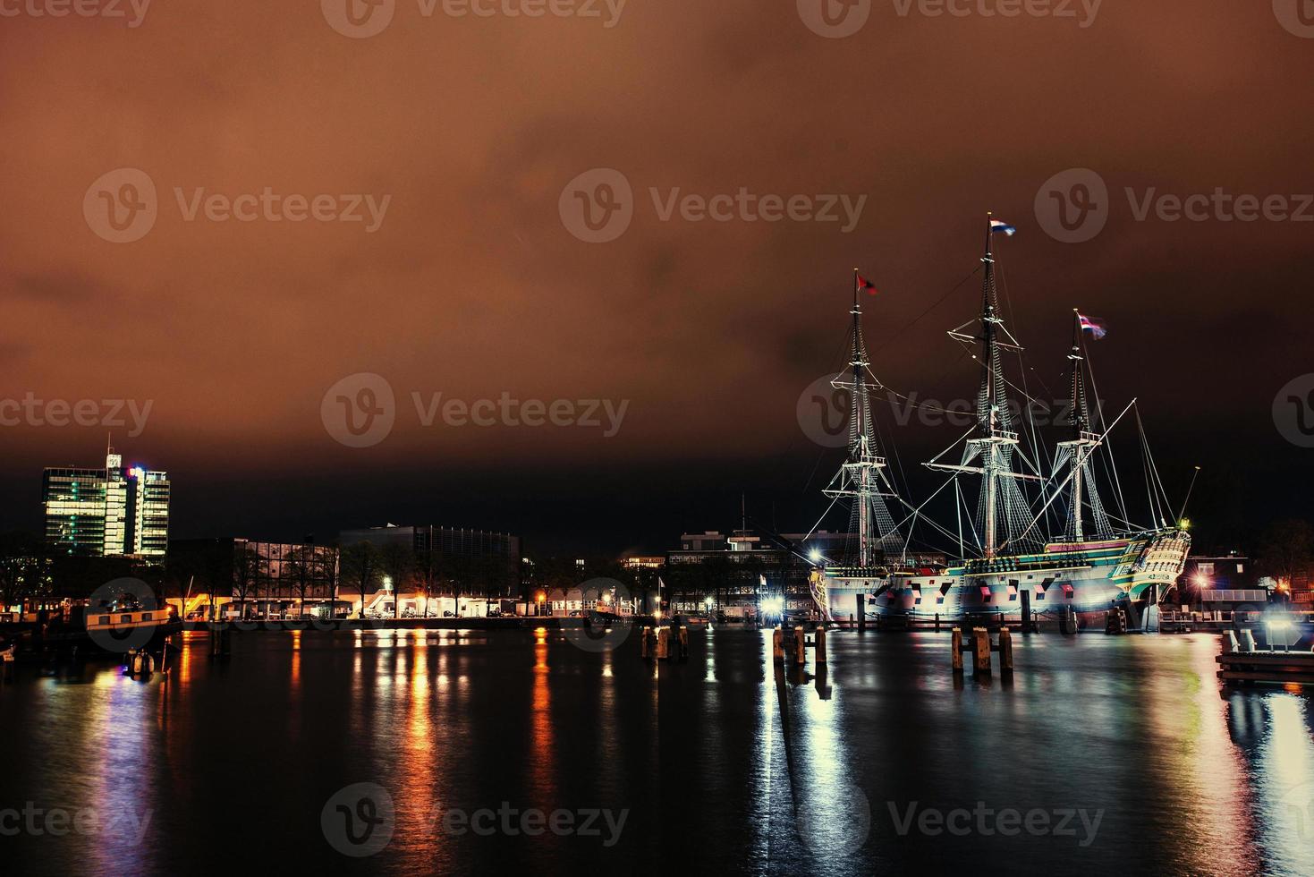 Beautiful night in Amsterdam.  illumination of buildings an photo