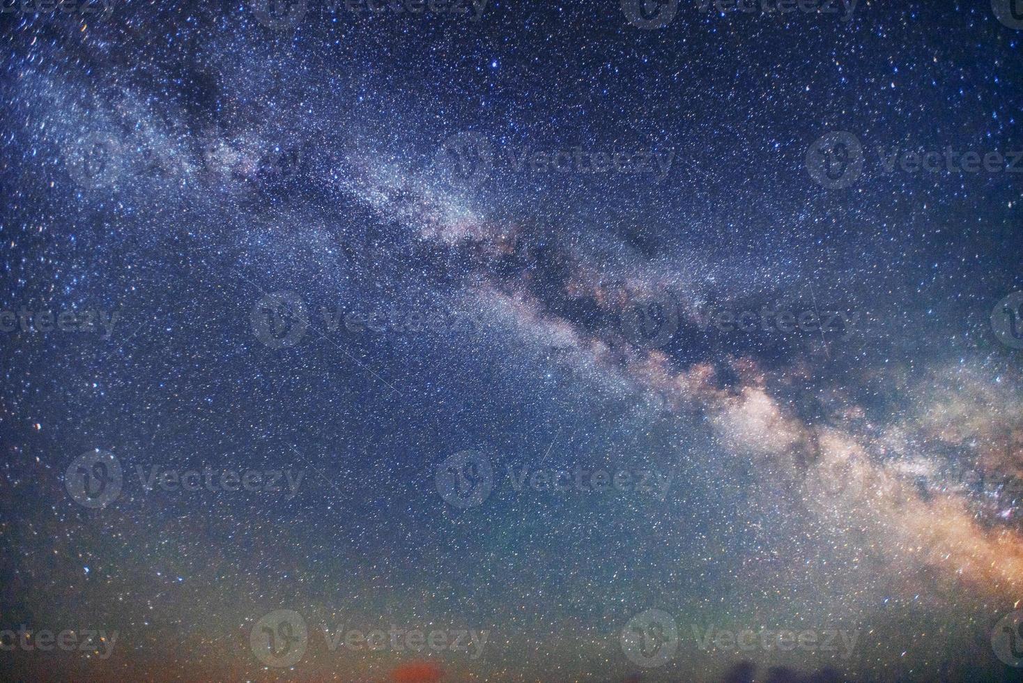 fantastic winter meteor shower and the snow-capped mountains photo