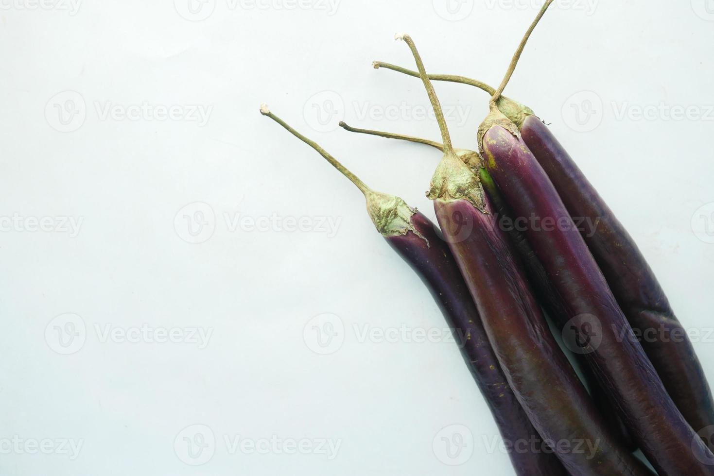 top view of eggplant on white background photo