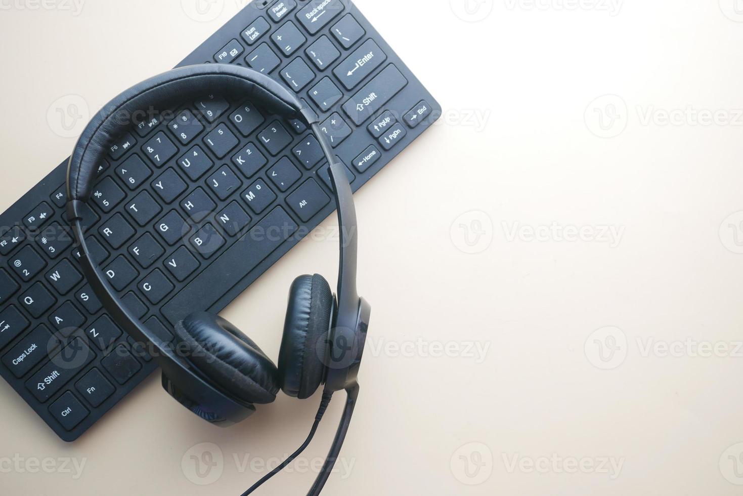 call center headphone on laptop on table , photo