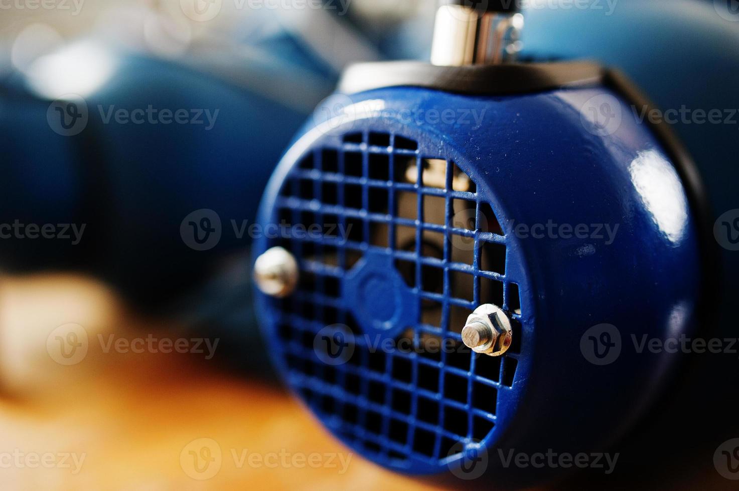 New blue electric motor at work. photo
