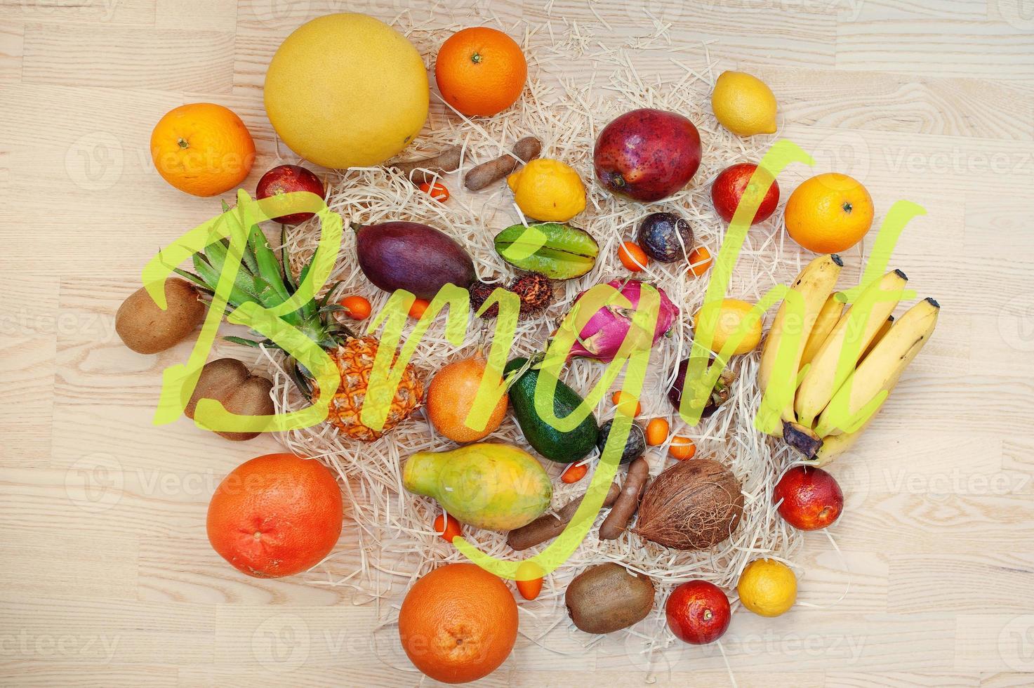 Exotic fruits with bright sign. Healthy eating dieting food background. photo