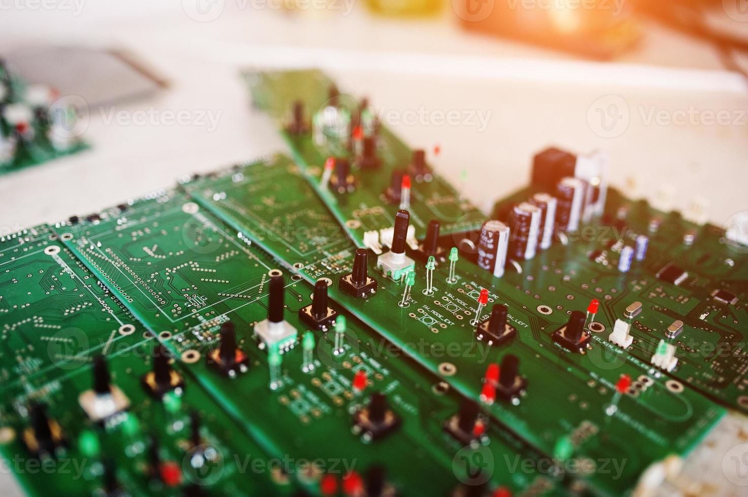 Circuit board of electronic computer hardware technology. Motherboard digital chip. photo