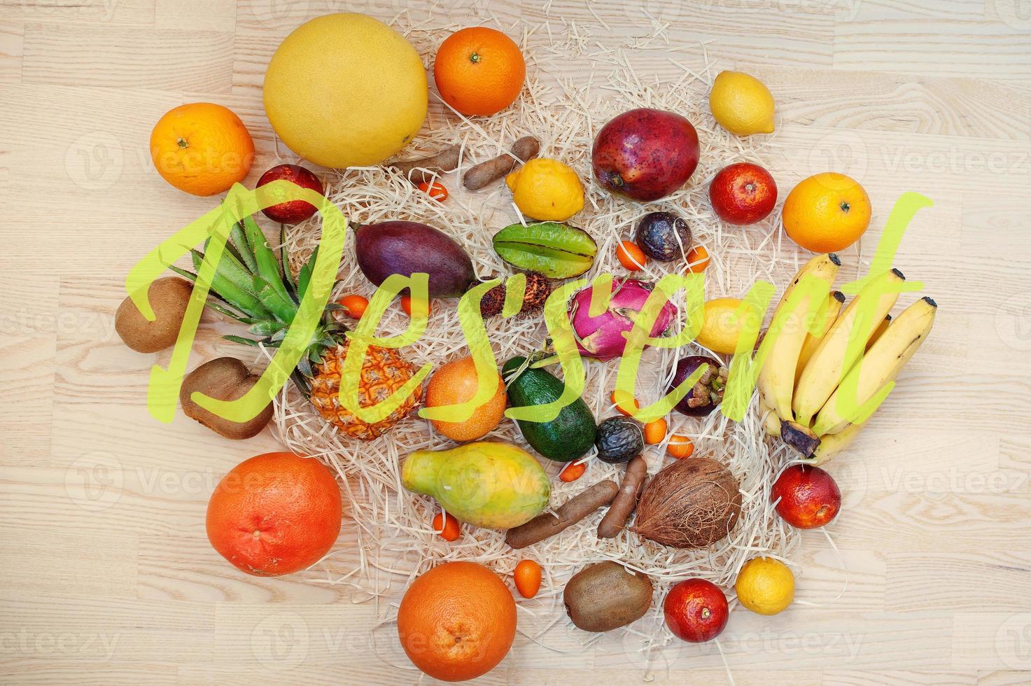 Exotic fruits with desert sign. Healthy eating dieting food background. photo
