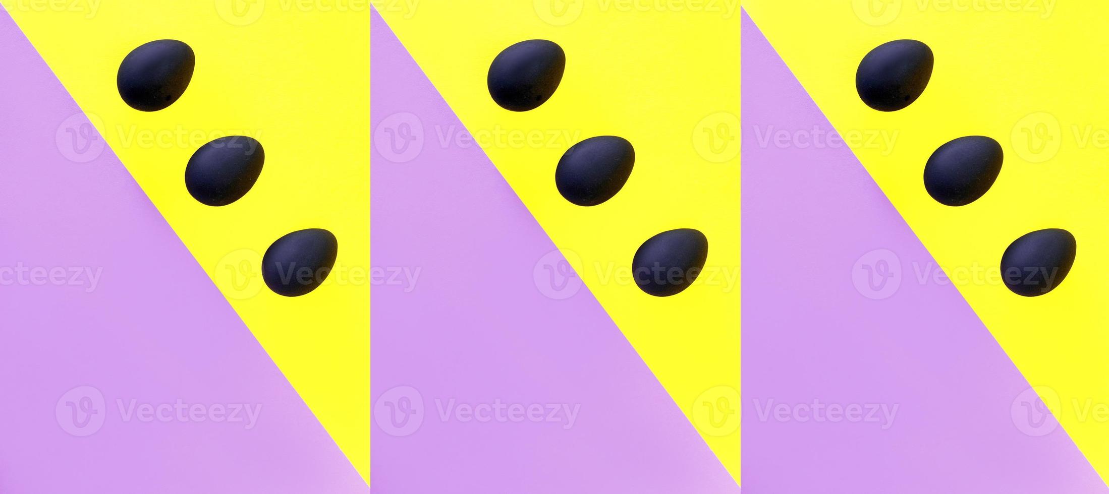 huevos negros sobre el fondo amarillo y violeta. pascua, diversidad, geométrico, patrón, concepto de comida foto