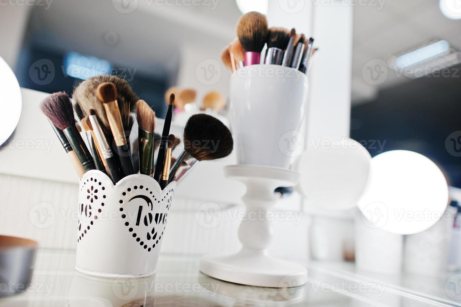 Set of make up brushes at beauty salon. photo