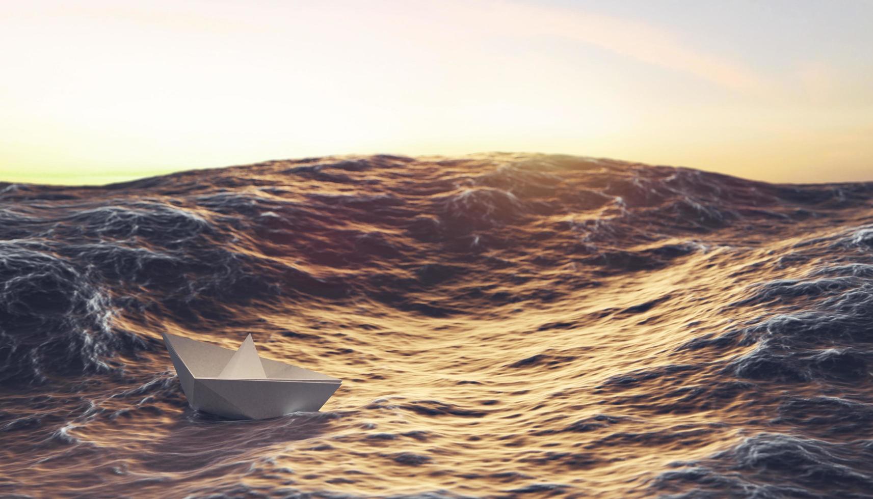 sunset with paper boat fighting wave in ocean, leadership and business concept photo