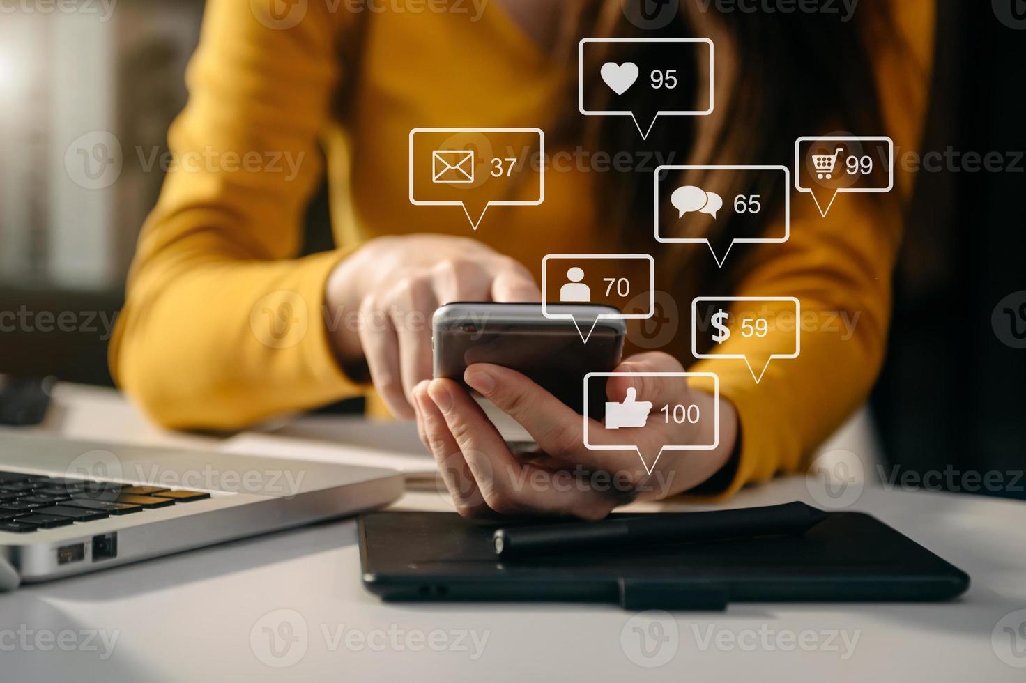 Social media and Marketing virtual icons screen concept.close up of businesswoman typing keyboard with laptop computer photo