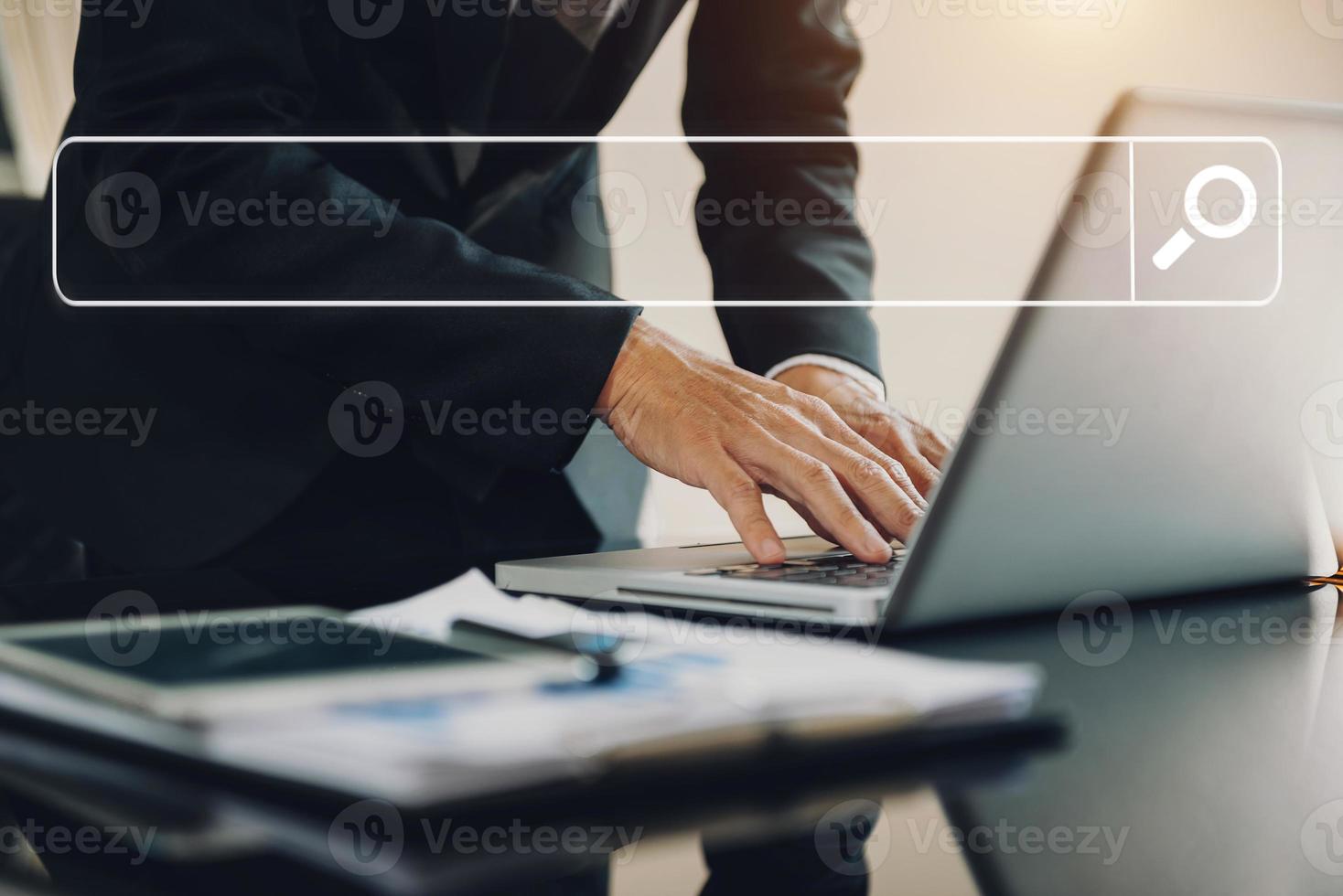 Searching Browsing Internet Data Information with blank search bar.business working with smart phone, tablet and laptop in office. photo