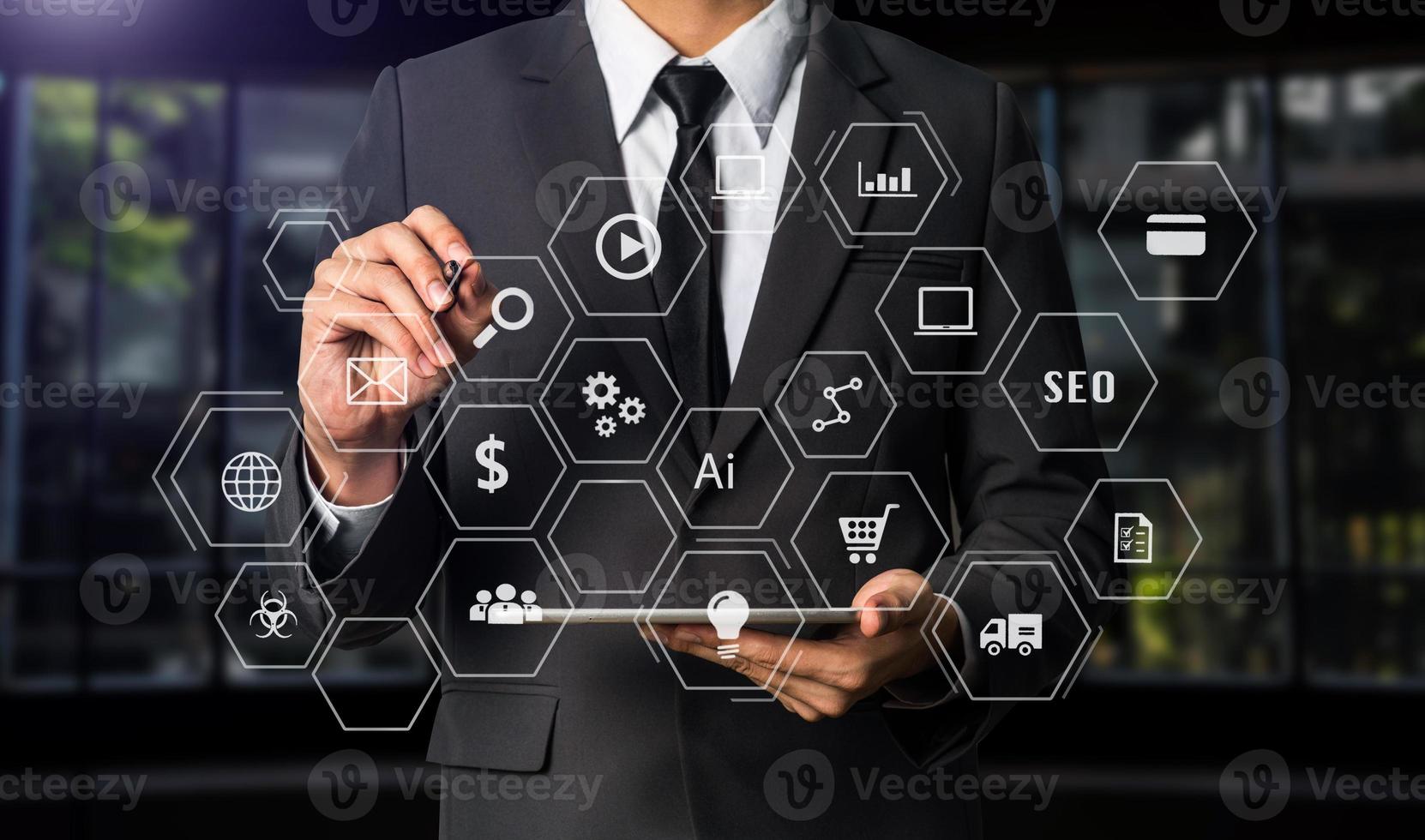 Businesswoman hand working digital marketing media in virtual screen with tablet photo