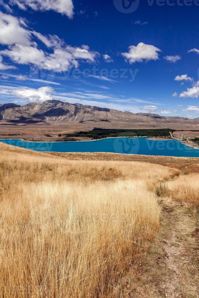 Scenic view of the countryside around Lake Tekapo in New Zealand photo