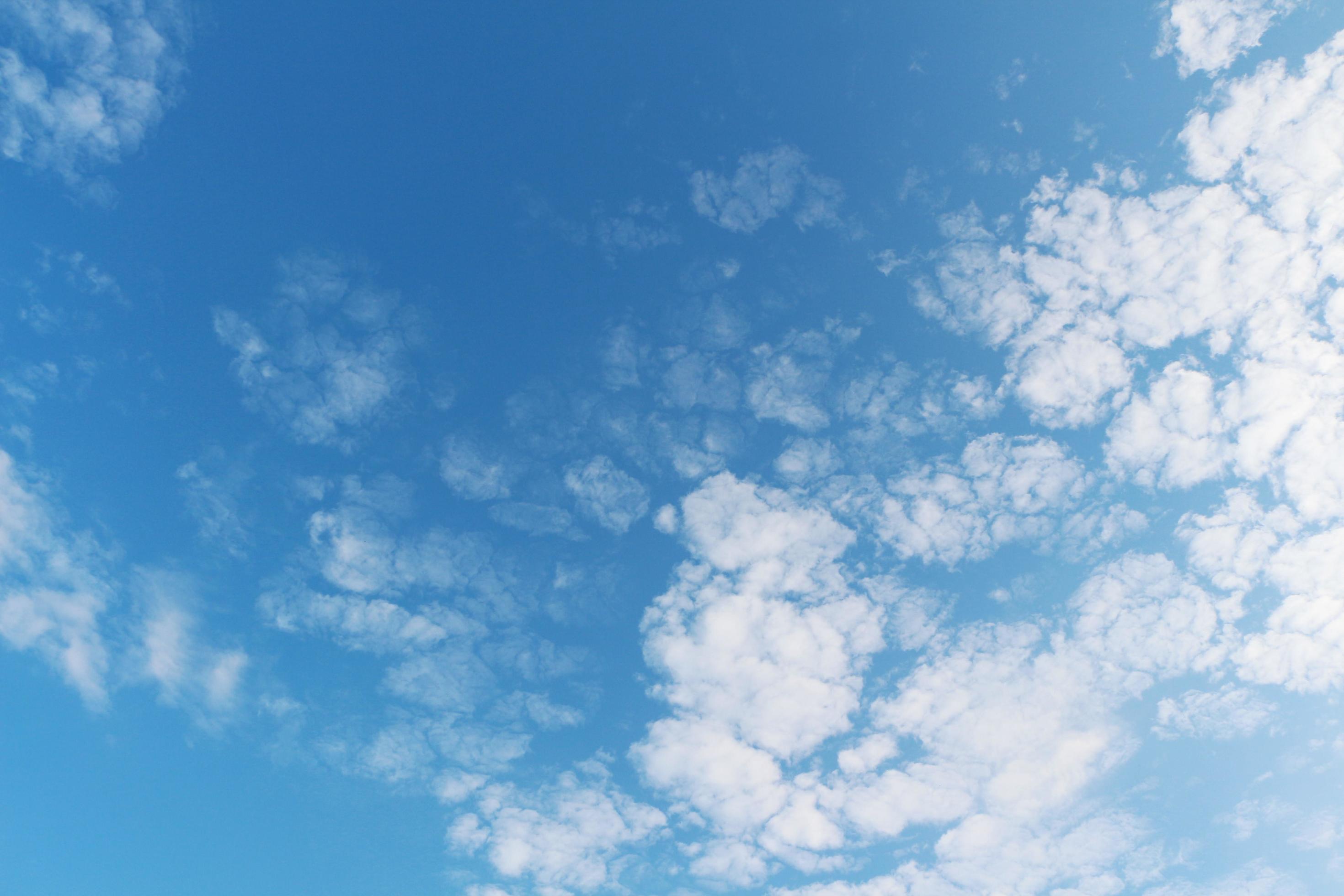 Bright blue sky with white clouds on a clear day. 6761068 Stock Photo ...
