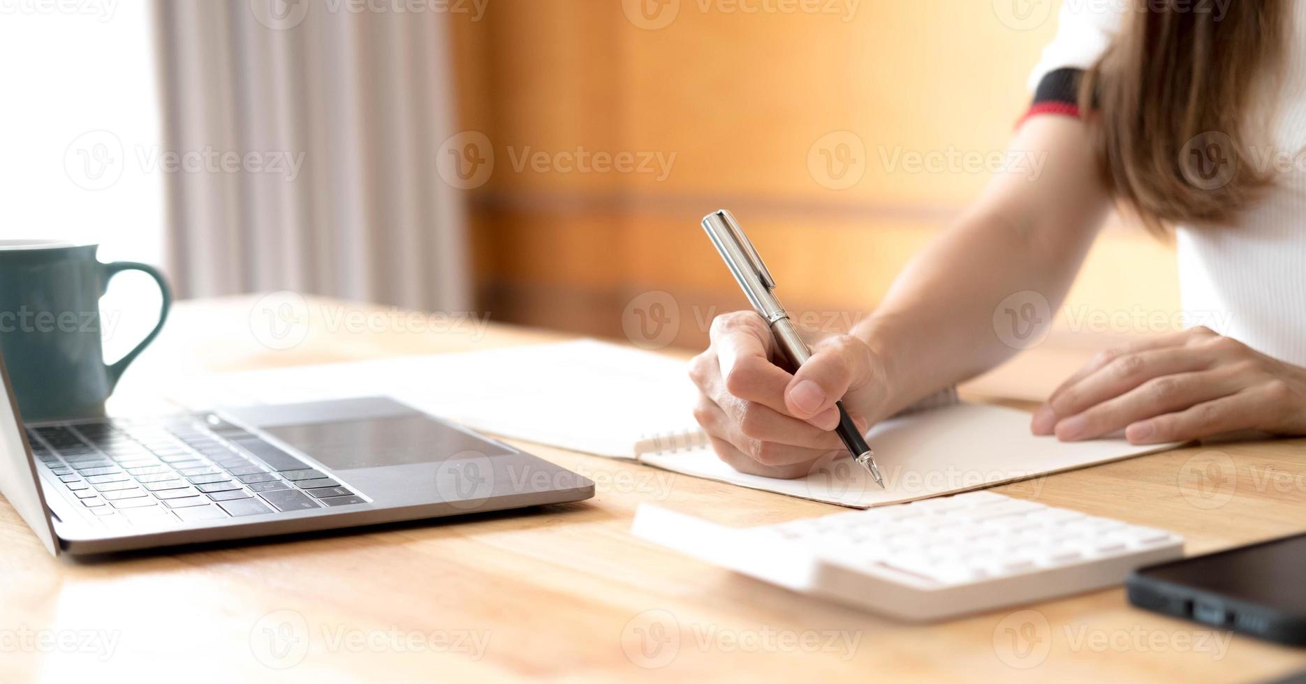 Close up woman financial inspector and secretary making report calculating balance. Internal Revenue Service checking document. photo