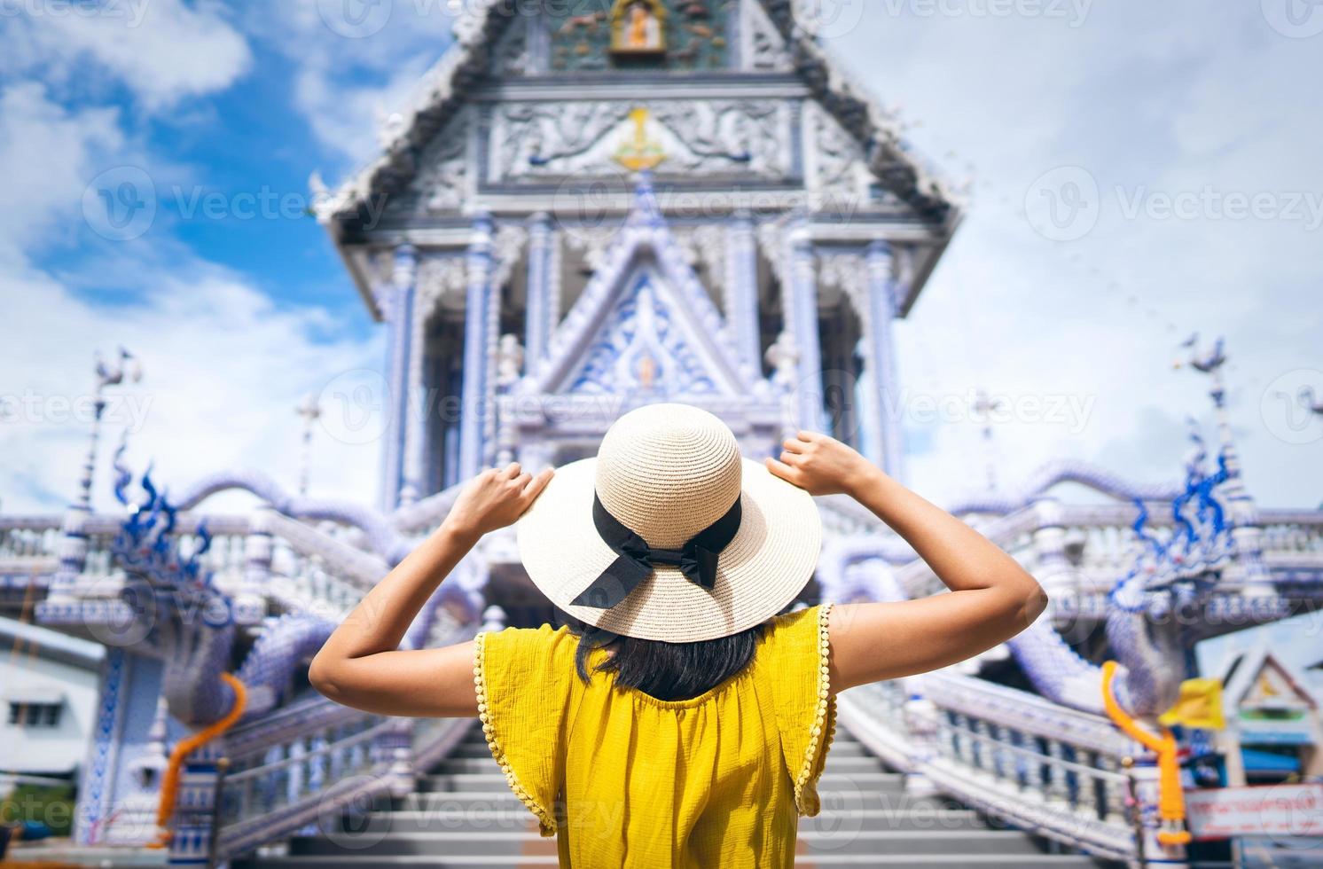 Back view of solo woman asia outdoor local travel wanderlust in Thailand photo