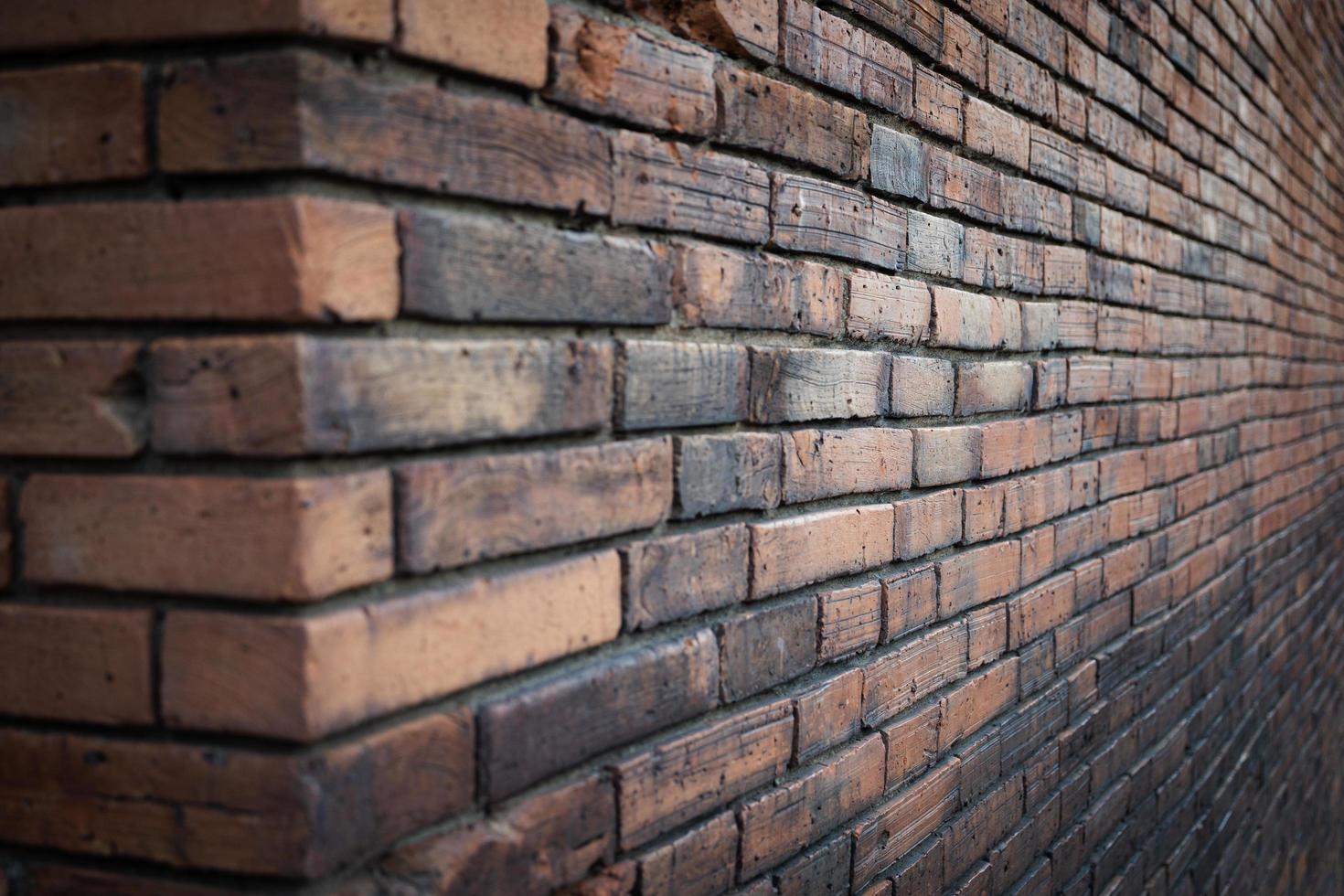 old red brick wall corner background photo