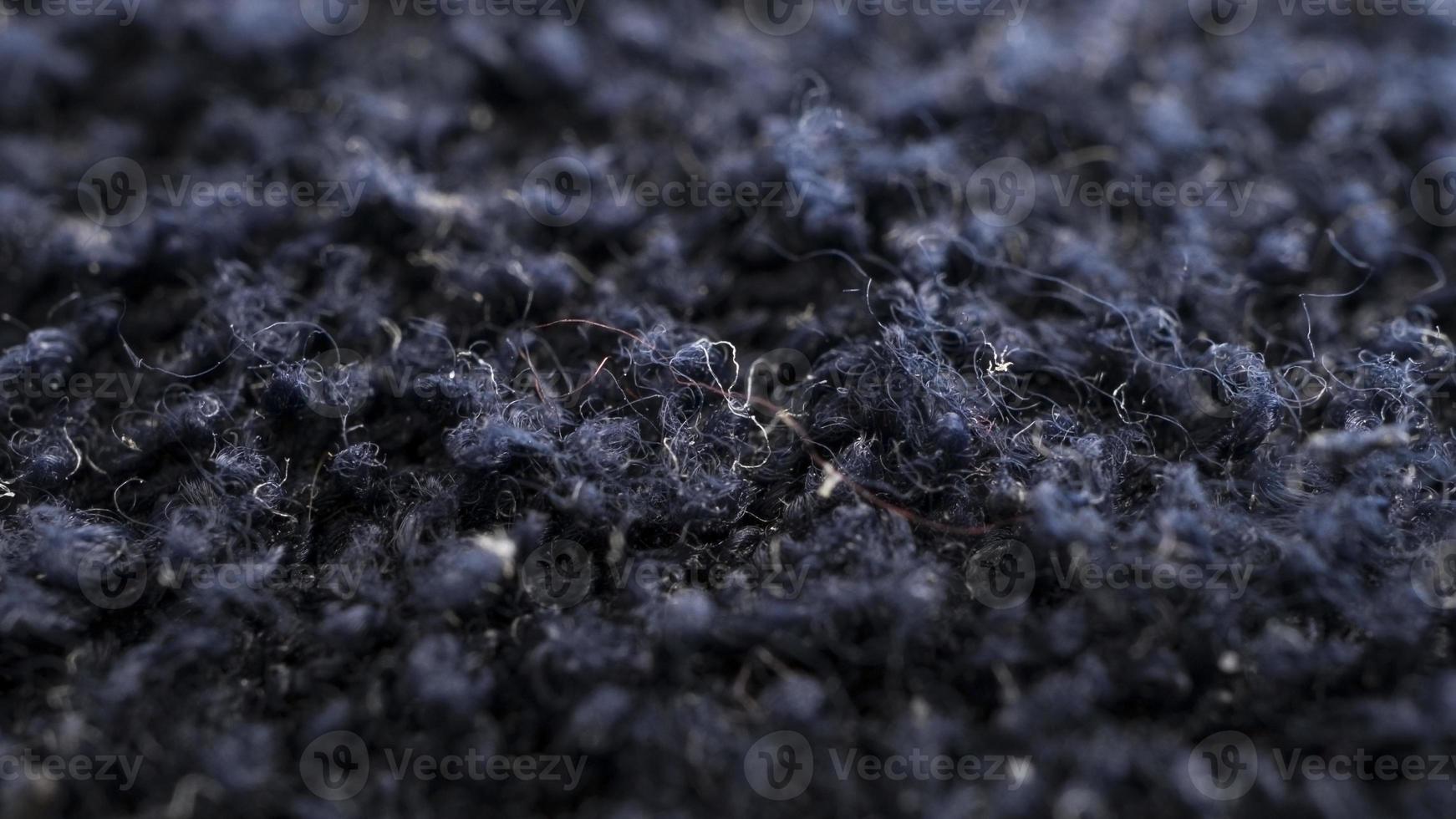 Wide macro horizontal shot of fabric as background with copy space. Textile super close-up with selective focus. photo