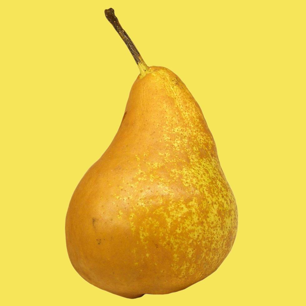 Pear fruits picture isolated over yellow background photo